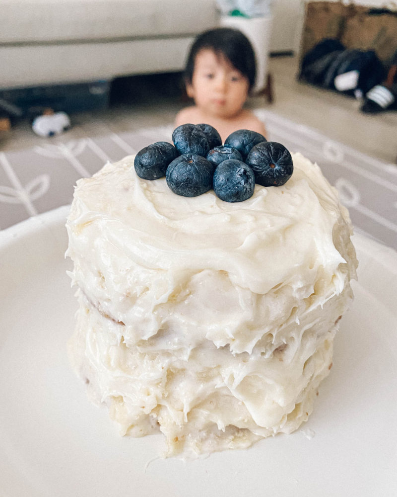 baby and birthday cake